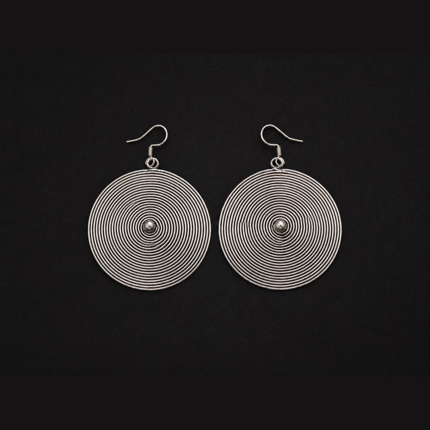 Handcrafted Miao Silver Spiral Disc Earrings – Minimalist Ethnic Statement Jewelry | Orithing