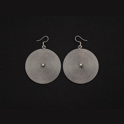 Handcrafted Miao Silver Spiral Disc Earrings – Minimalist Ethnic Statement Jewelry | Orithing