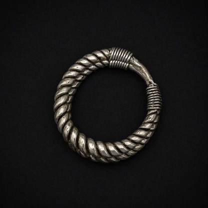 Handcrafted Miao Silver Twisted Cuff Bracelet – Minimalist Spiral Statement Jewelry | Orithing