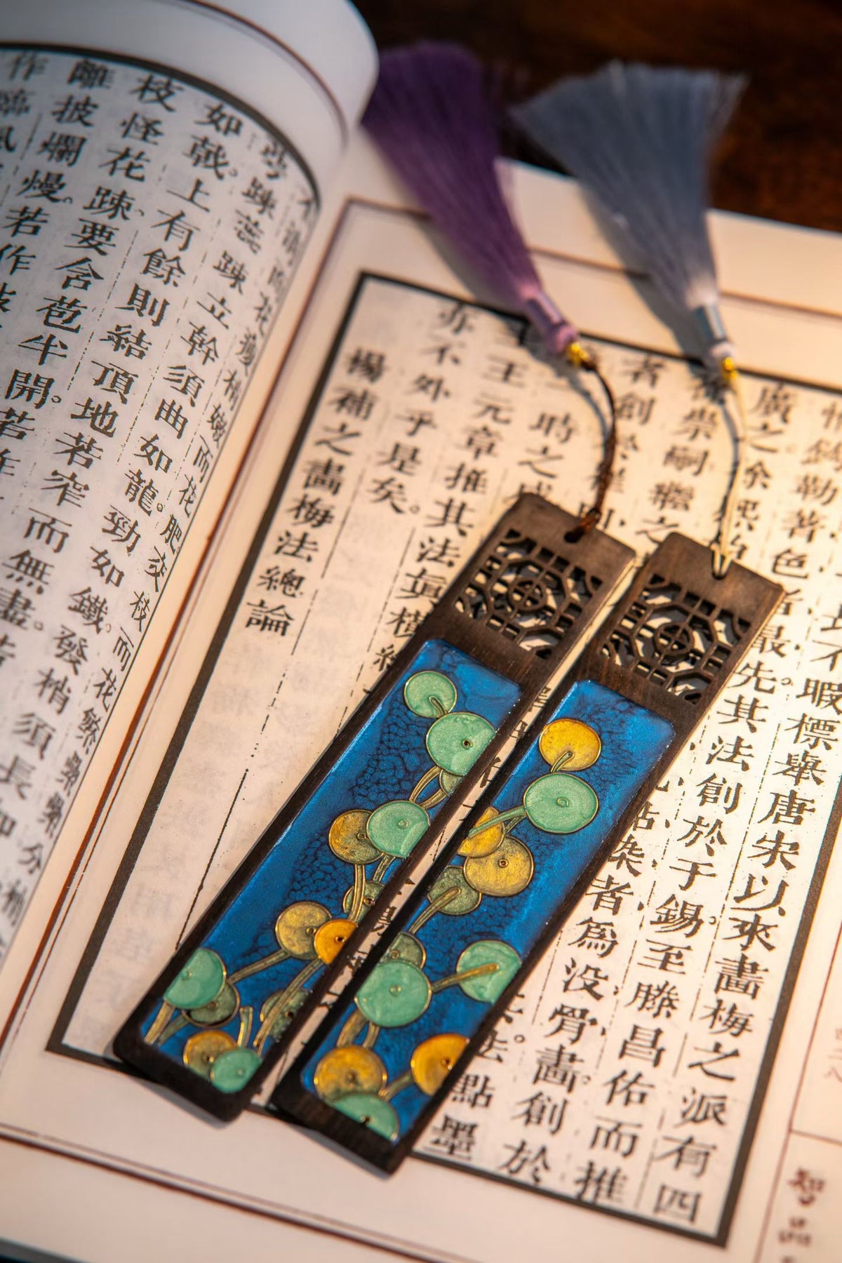 Cloisonne enamel bookmark: Two yellow floral designs on an open book