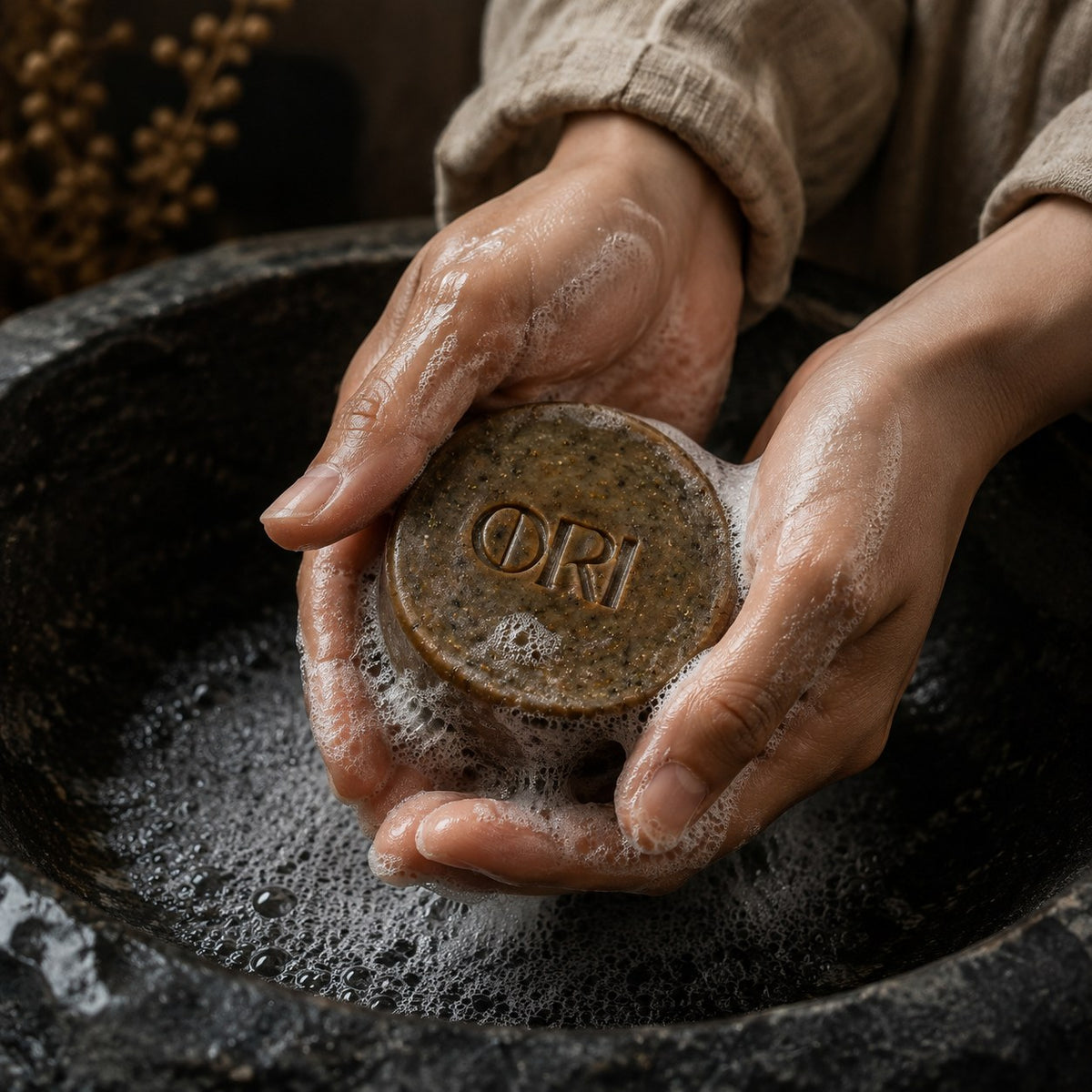 Dong herbal facial soap bar: Held in wet hands with light lather