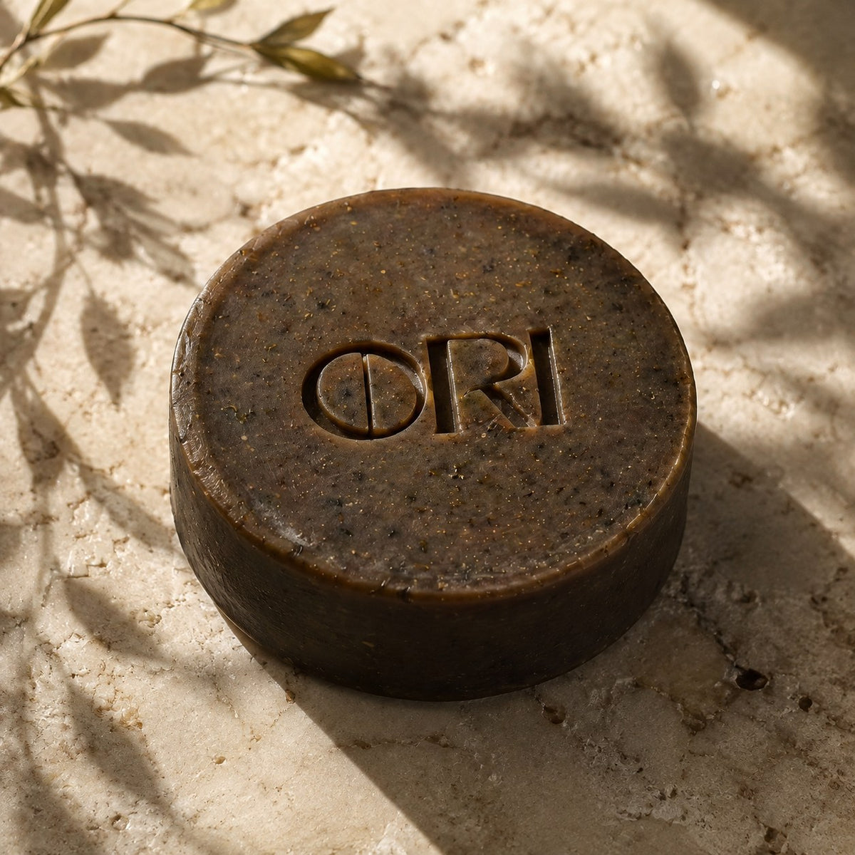 Dong herbal facial soap bar: Lying on sunlit stone