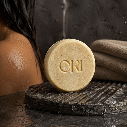 Ginger and astragalus shampoo bar: Beside wet hair and folded towels