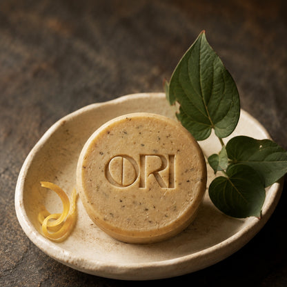 Heartleaf and goat milk soap bar: In a ceramic bowl with lemon peel