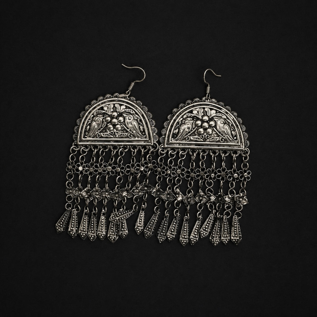Miao silver filigree tassel earrings: Pair showing openwork panels and hanging tassels