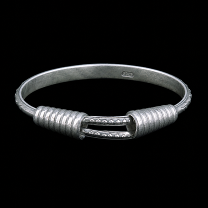 Miao silver spiral bracelet: Front view of coiled ends and slender band