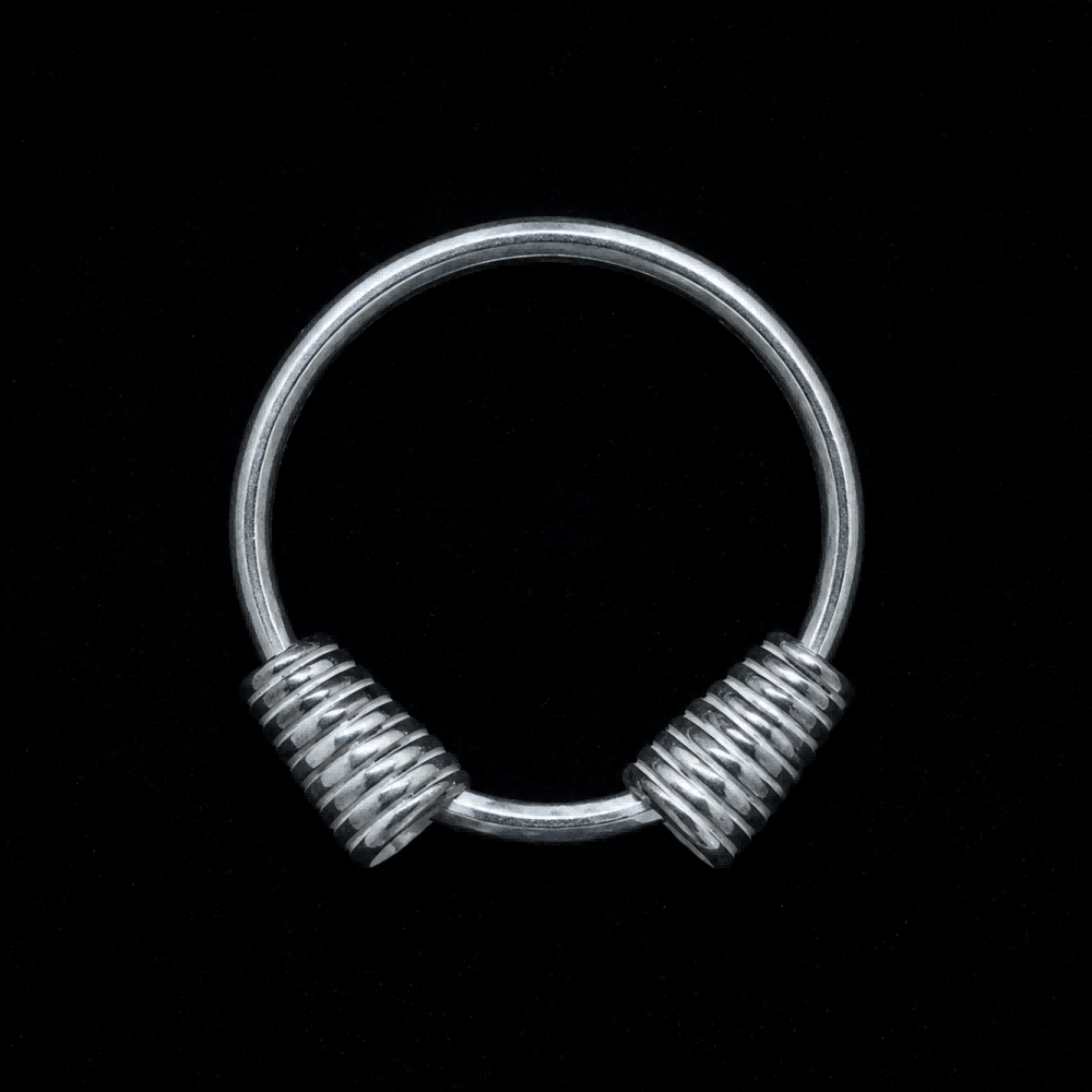 Miao silver spiral bracelet: Round bracelet with coiled ends on black