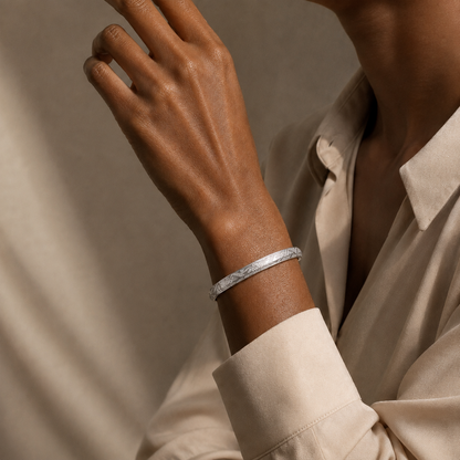 Miao silver spiral bracelet: Slim spiral bracelet worn on a raised wrist