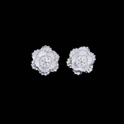 Miao silver textured flower studs: Front view of the textured flower stud pair