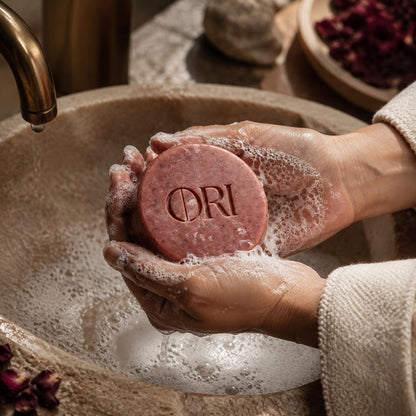 Rose milled soap bar: Lathered in hands over a basin