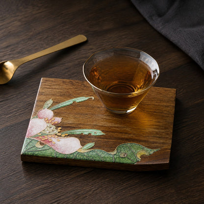 Square walnut cloisonne coaster: Pink floral design beneath a glass teacup