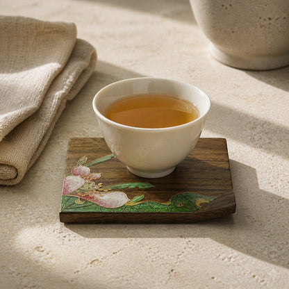 Square walnut cloisonne coaster: Pink floral design beneath a white cup