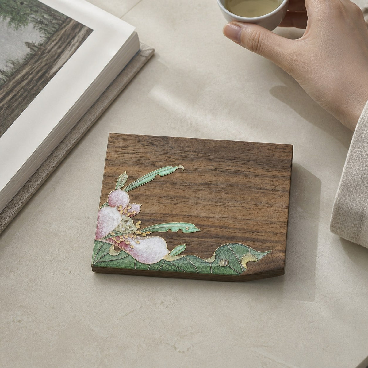 Square walnut cloisonne coaster: Pink floral design beside an open book