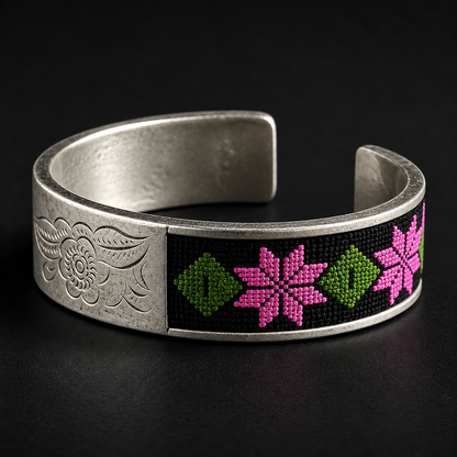 Xixiu embroidered alloy cuff: Close-up of floral embroidery and engraved metal