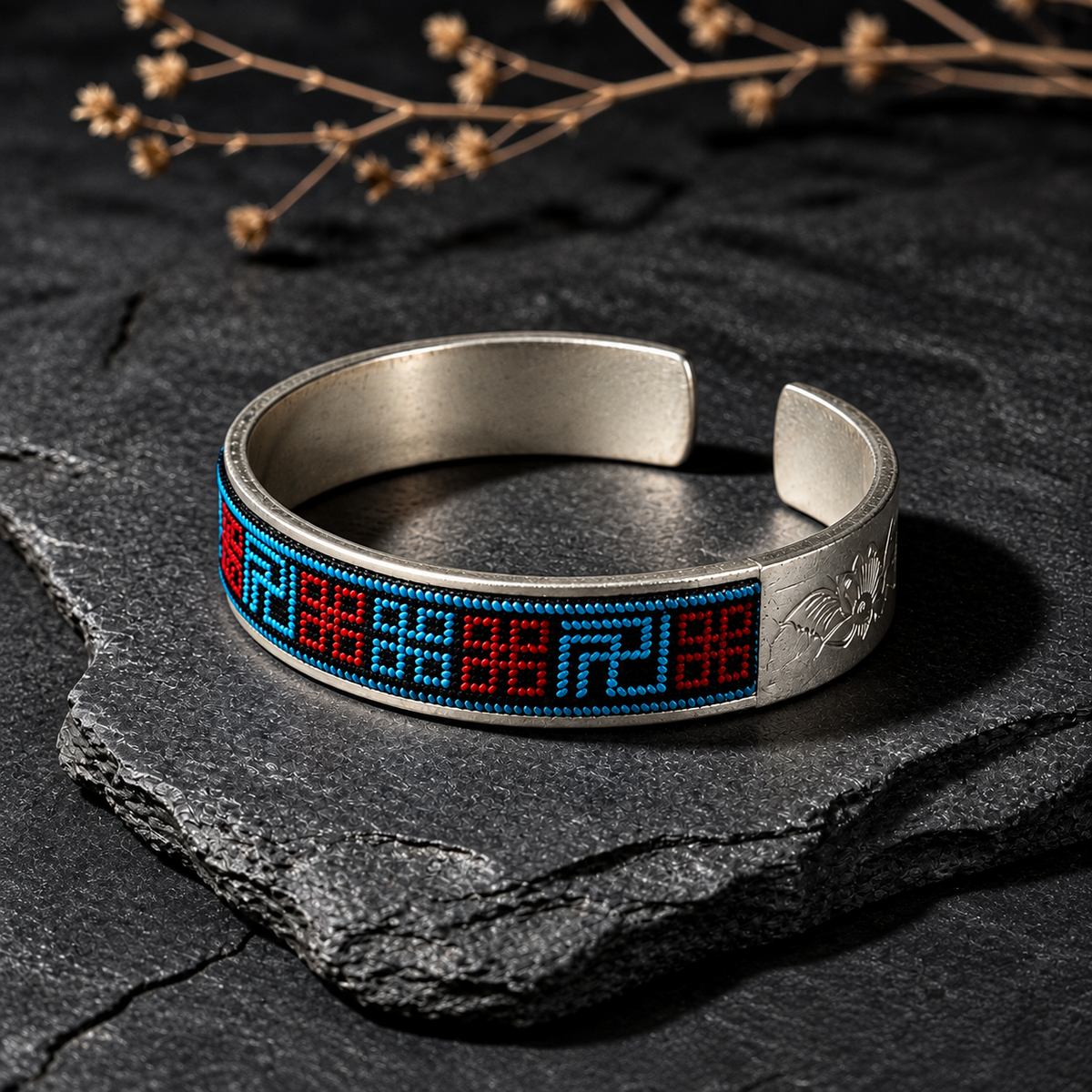 Xixiu embroidered silver cuff: Blue and red embroidered cuff on dark slate