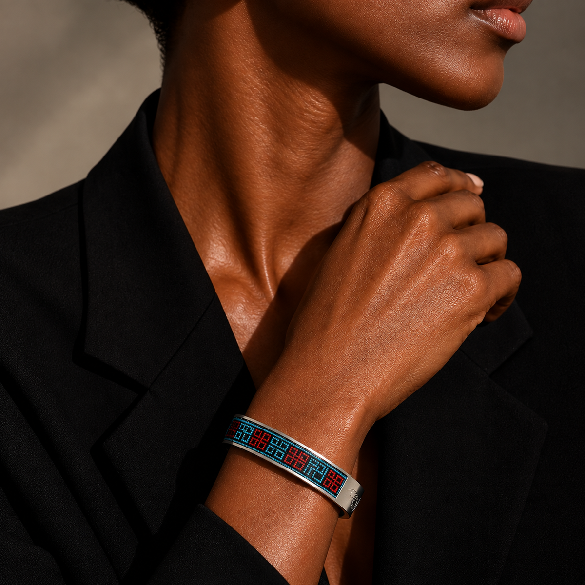 Xixiu embroidered silver cuff: Blue and red embroidered cuff worn with black clothing